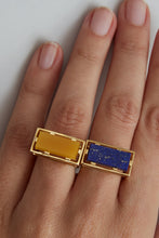 Load image into Gallery viewer, Gold square ring with lapis lazuli stone and yellow jade on woman&#39;s hand
