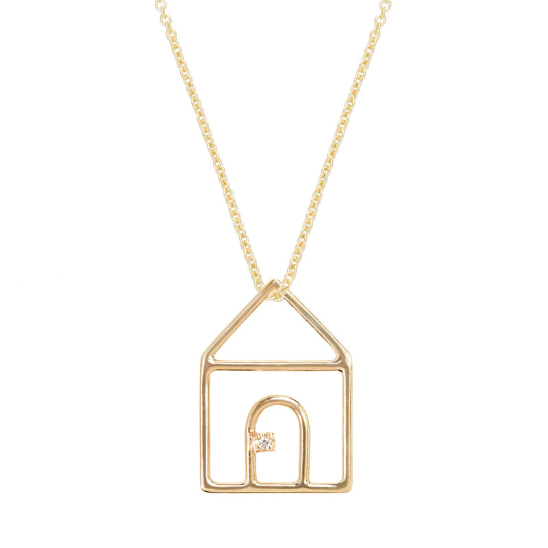 Gold chain necklace with house shaped pendant and small diamond