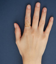 Load image into Gallery viewer, House shaped gold ring with small diamond on woman&#39;s hand
