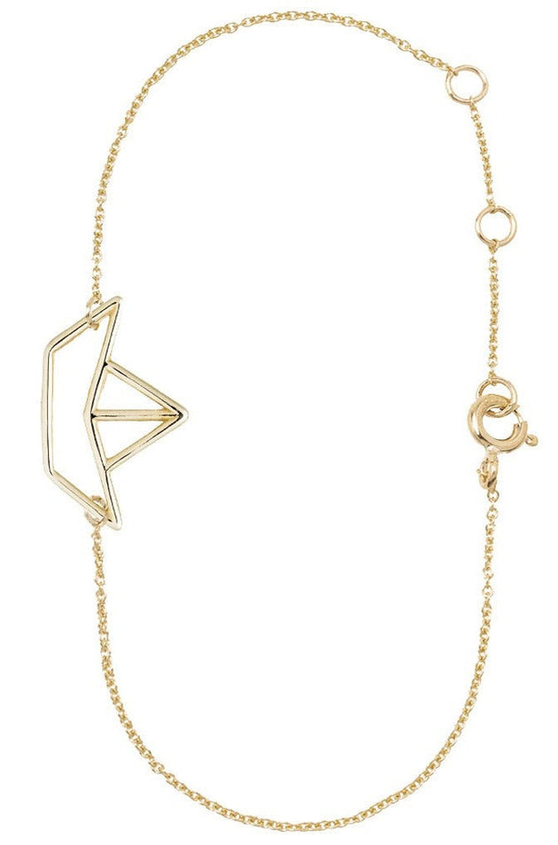 Gold chain bracelet with paper boat shaped pendant 