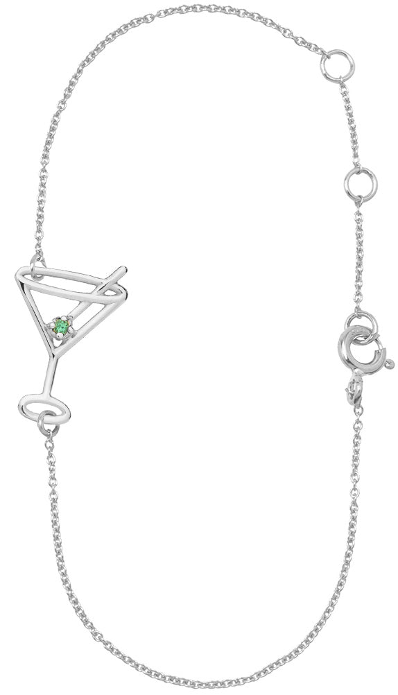 WHite gold chain bracelet with small martini drink shaped pendant with an emerald as the olive