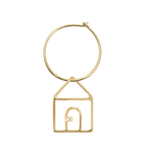 Gold hoop earring with house shaped pendant and small diamond