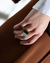 Load image into Gallery viewer, Gold square rings with jasper stone and blue jade worn by model
