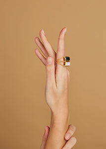 Gold square rings with jasper stone and white agate worn by model