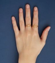 Load image into Gallery viewer, Shark and little boat shaped gold rings worn by model
