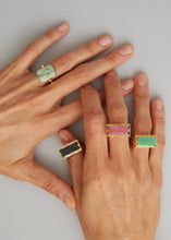 Load image into Gallery viewer, Gold rings with precious stones on woman&#39;s hands
