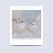 Load image into Gallery viewer, White gold shark shaped pendants on ice cubes
