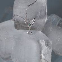 Load image into Gallery viewer, White gold chain necklace with martini drink shaped pendant and small emerald on ice cubes
