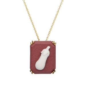 Gold chain necklace with an eggplant shaped cameo made in porcelain