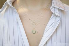 Load image into Gallery viewer, Gold chain necklace with pistachio ice pop pendant worn by model
