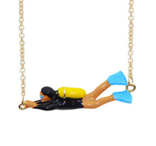 Load image into Gallery viewer, Gold chain necklace with scuba diver shaped pendant with blue enamel fins
