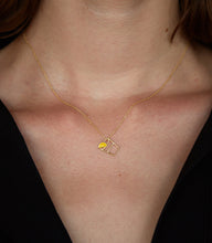 Load image into Gallery viewer, Gold chain necklace with tequila shot shaped pendant worn by model
