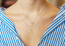 Load image into Gallery viewer, Gold chain necklace with chemistry baker shaped pendant worn by model
