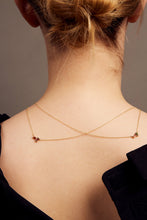 Load image into Gallery viewer, Gold rolo chain necklaces with a baguett cut stones on woman
