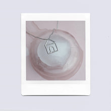 Load image into Gallery viewer, White gold chain necklace with house shaped pendant on ice cubes
