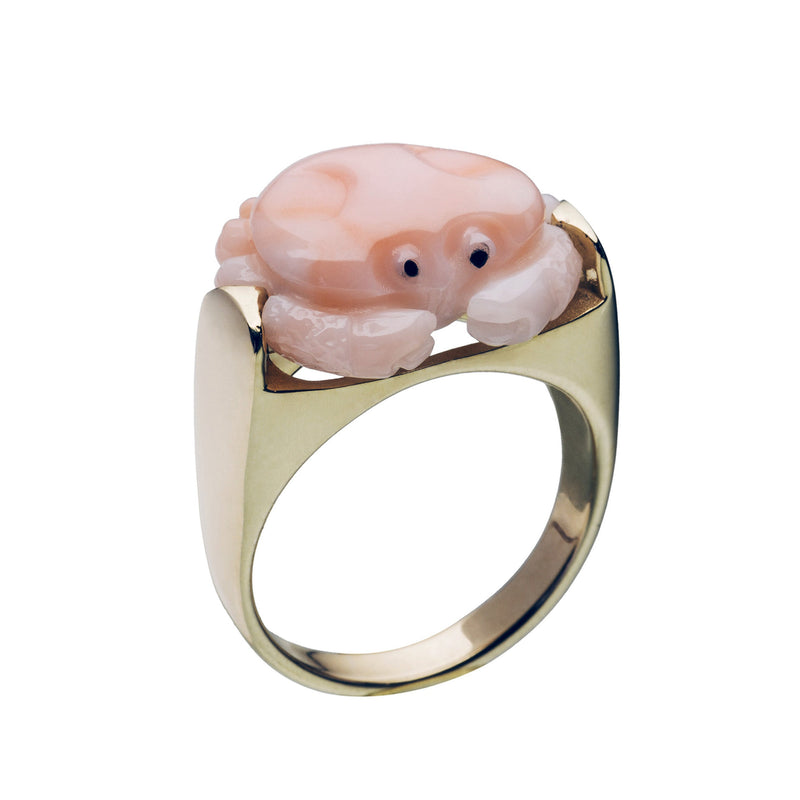 Gold ring with crab shaped pink coral