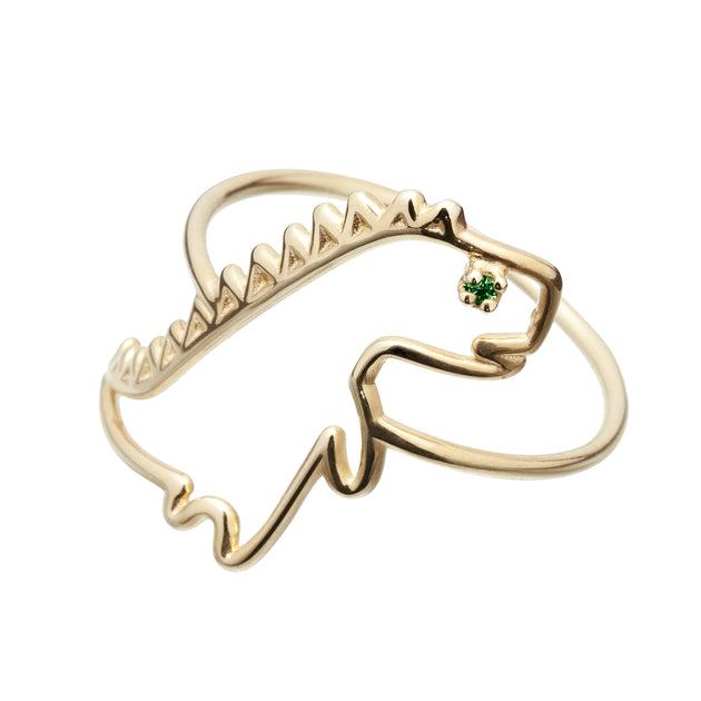 Dinosaur shaped gold ring and small emerald