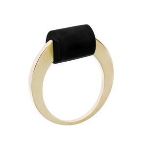 Gold ring with a cylinder cut black agate stone