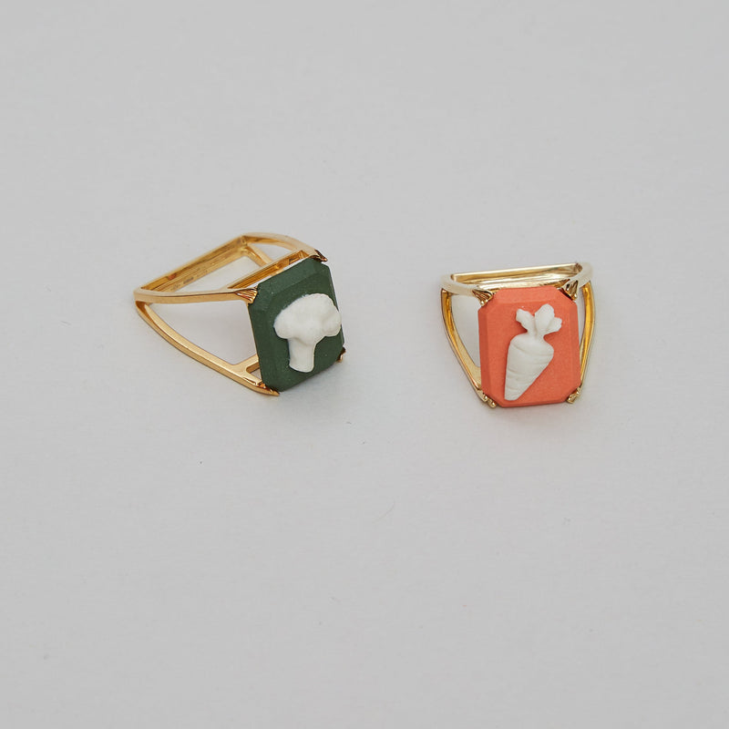 Gold rings with broccoli and carrot porcelain cameo